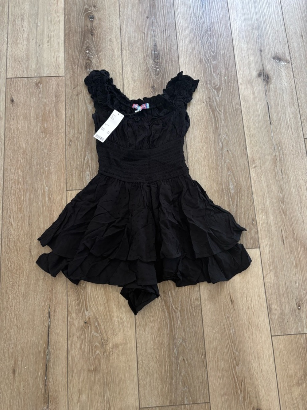 Urban Outfitters Rosie Smocked Tiered Ruffle Romper. 
 Size xs net